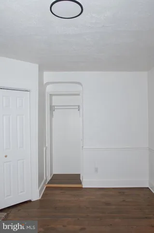 a view of a livingroom with wooden floor