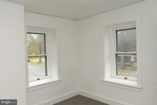 an empty room with window