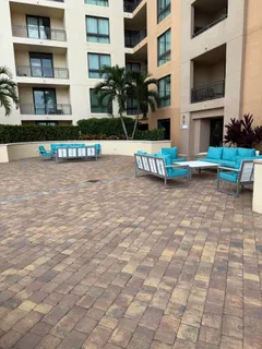 a kitchen with a table and chairs in it