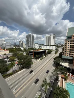a city view with train on the street