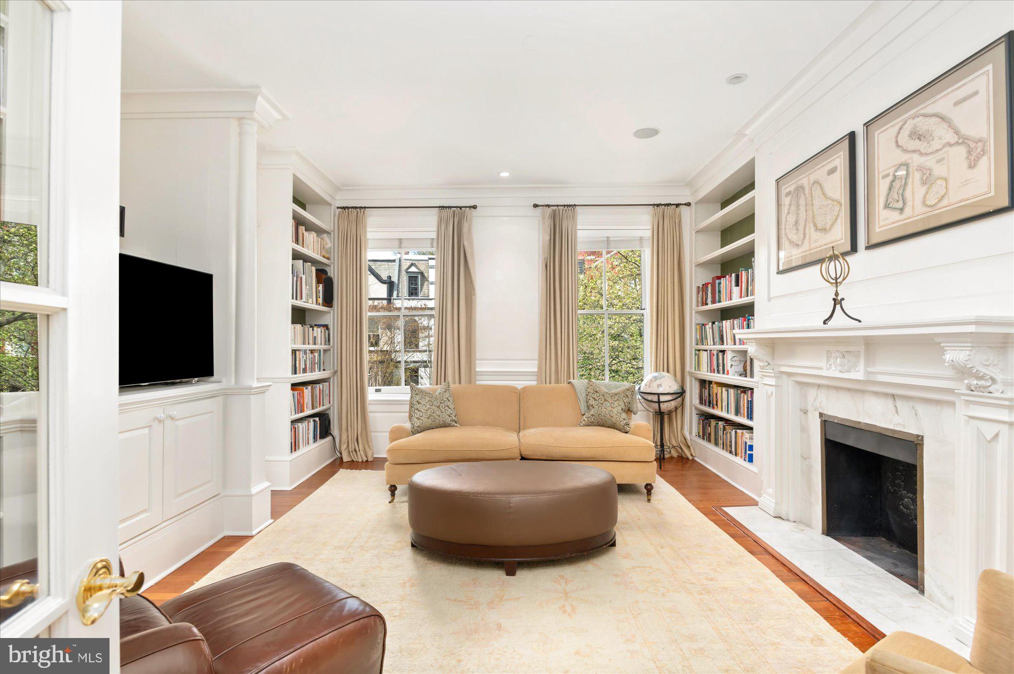 2238 Q Street Northwest Washington, DC 20008 - Photo 15 of 35 a living room with furniture and a flat screen tv