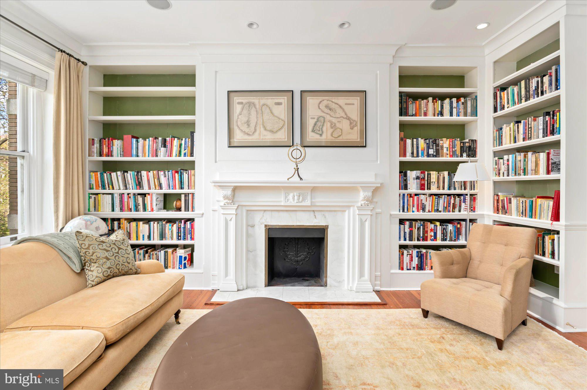 2238 Q Street Northwest Washington, DC 20008 - Photo 16 of 35 a living room with furniture and a book shelf