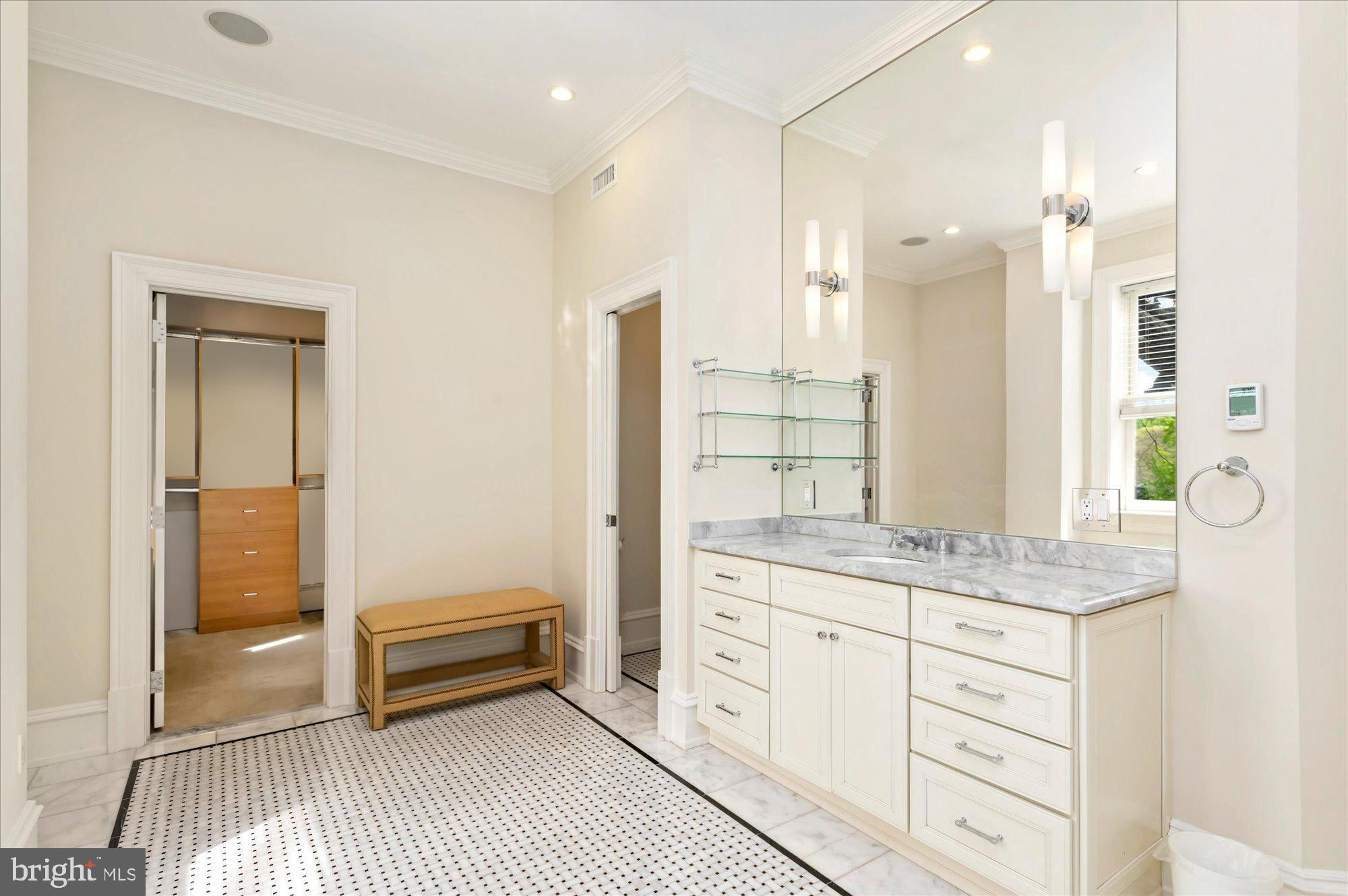 2238 Q Street Northwest Washington, DC 20008 - Photo 18 of 35 a bathroom with a granite countertop sink mirror and
