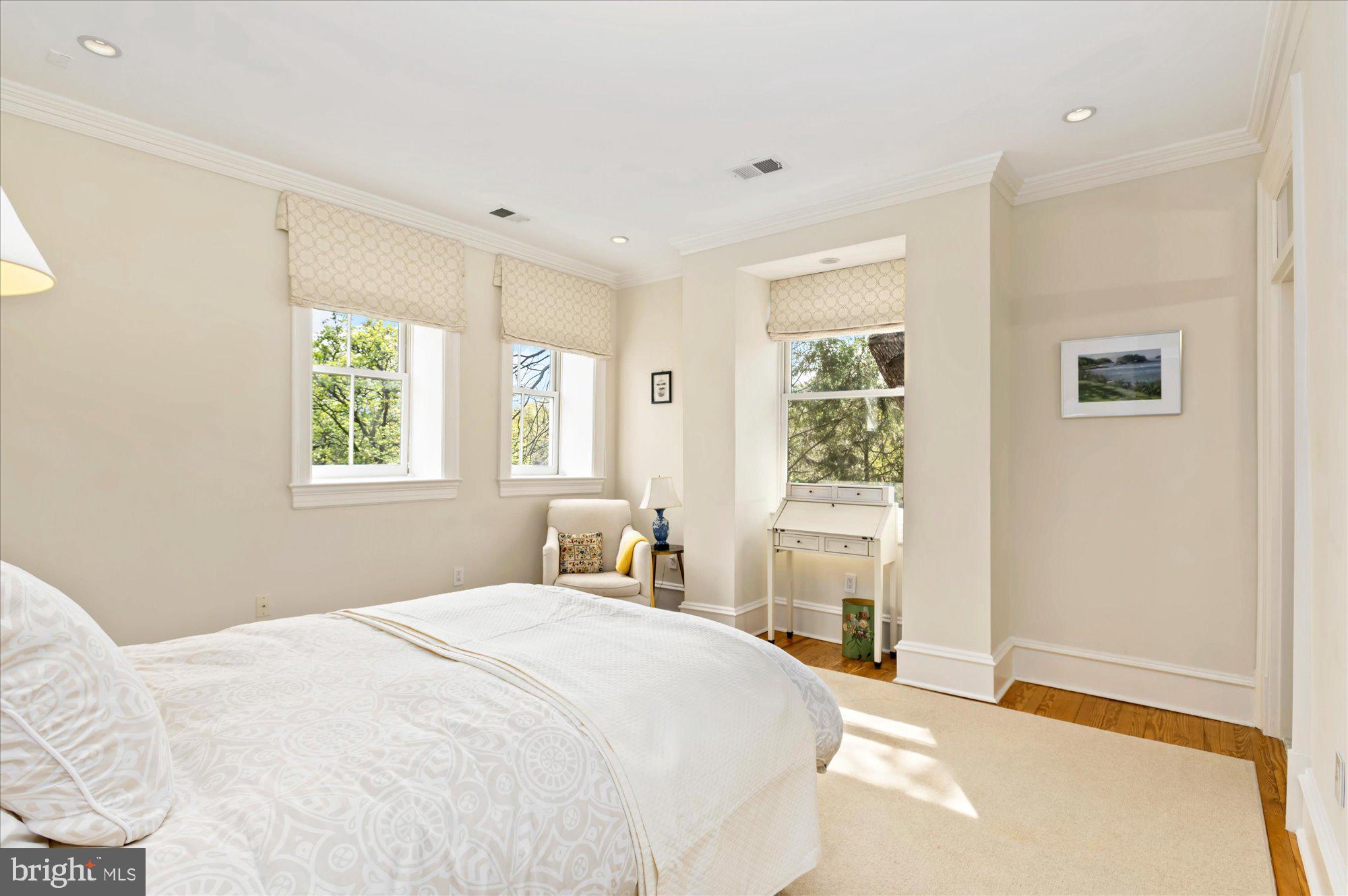 2238 Q Street Northwest Washington, DC 20008 - Photo 24 of 35 a bedroom with a bed and a window