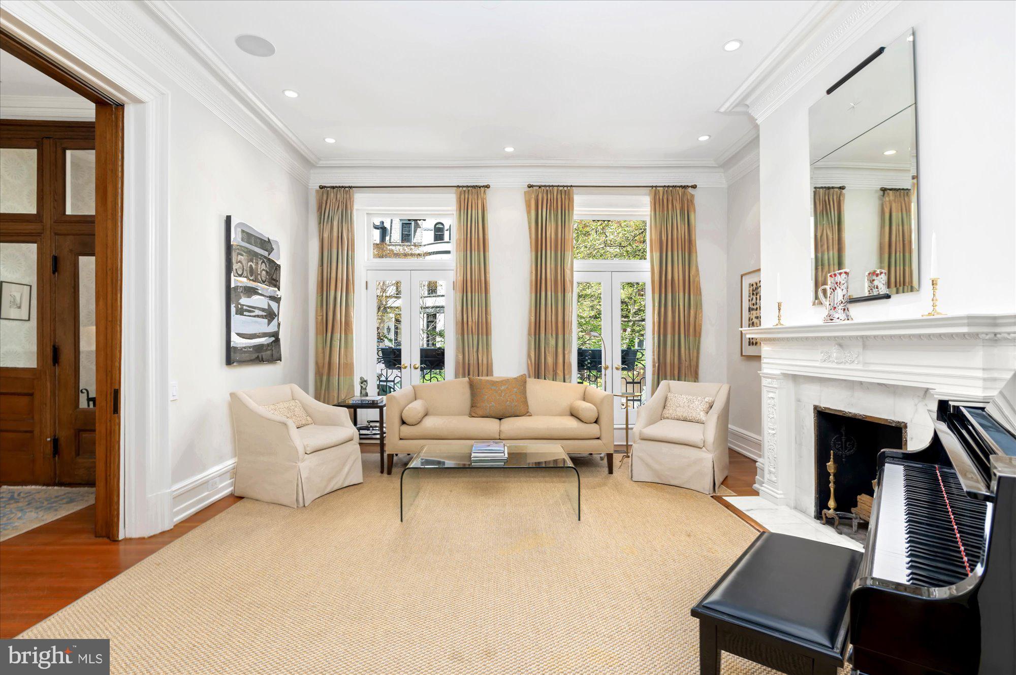 2238 Q Street Northwest Washington, DC 20008 - Photo 5 of 35 a living room with furniture and a fireplace