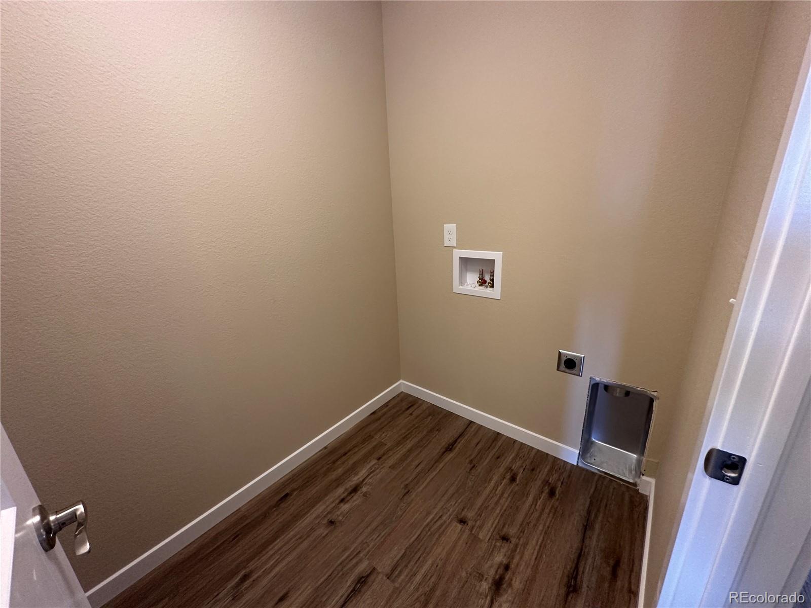 4213 Date Street Colorado Springs, CO 80917 - Photo 19 of 20 a view of a room with wooden floor