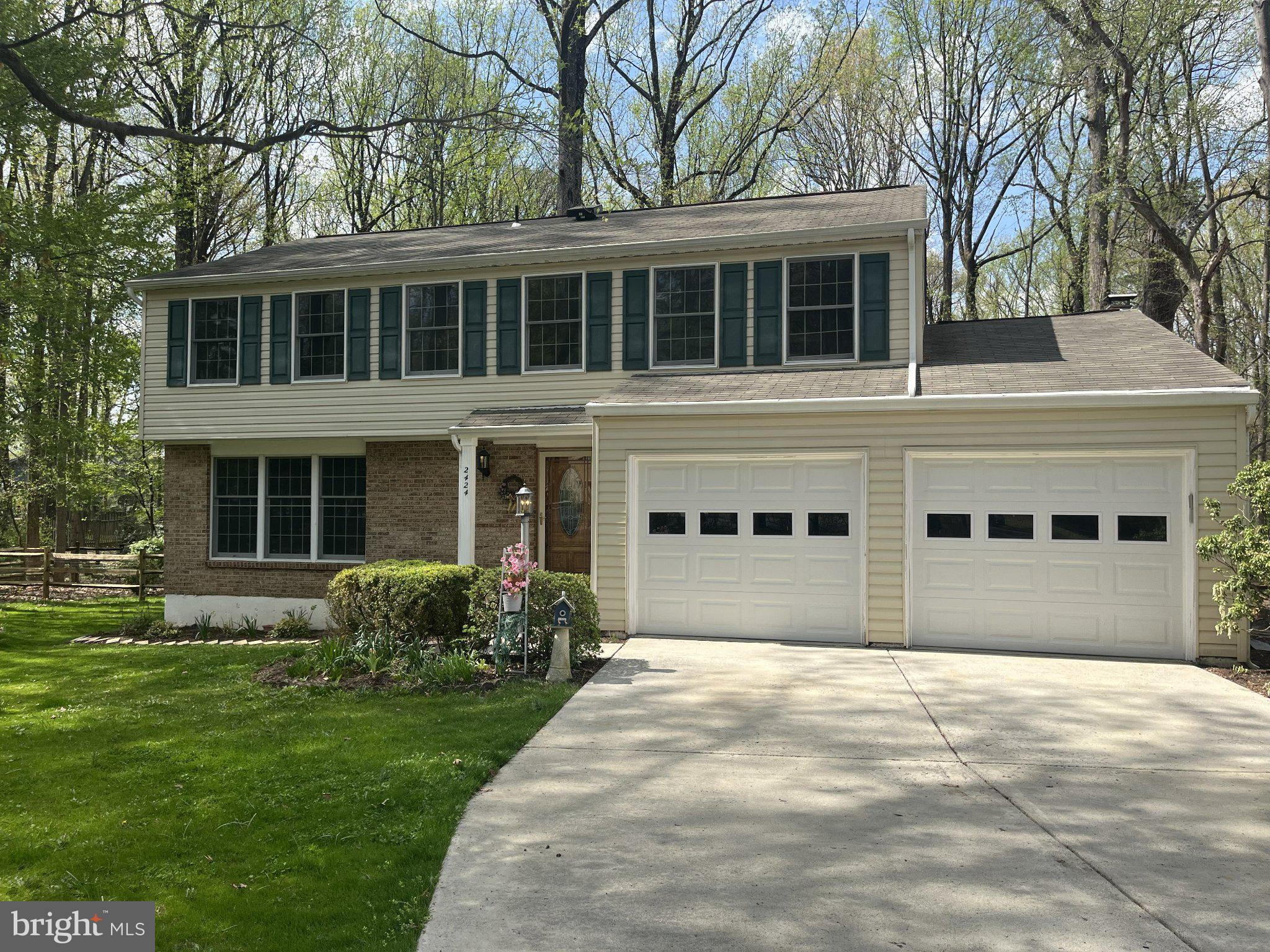 2424 Freetown Drive Reston, VA 20191 - Photo 1 of 1 Charming home nestled in lush greenery.