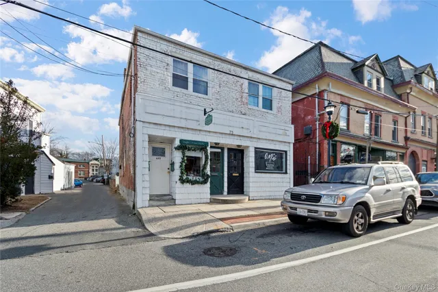 a view of a car park in front of a building