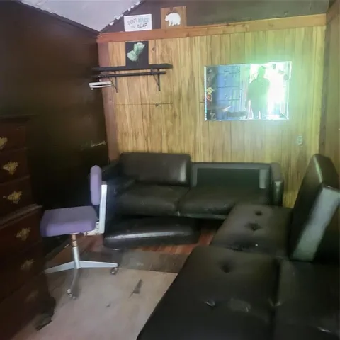 a living room with furniture and a couch