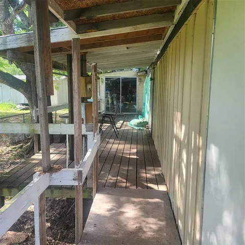 a view of swimming pool with outdoor seating