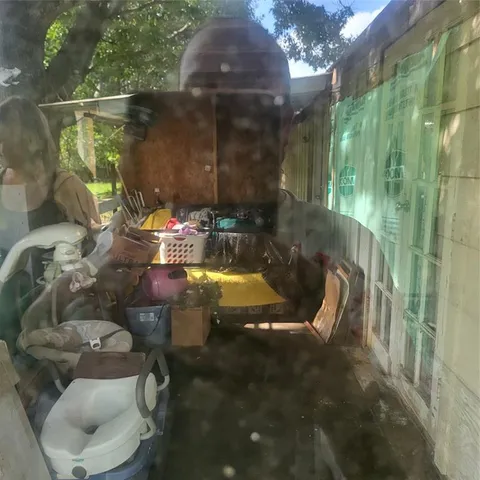 a view of balcony with furniture