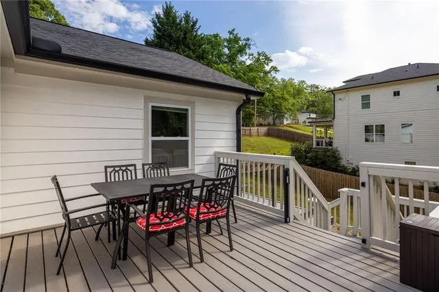 a view of a deck with furniture