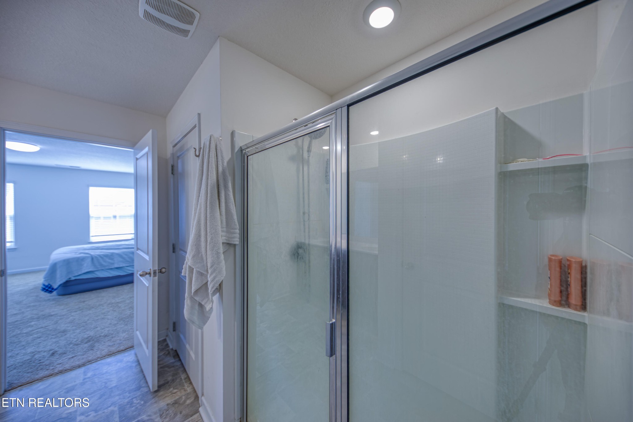 187 Ibis Loop Oak Ridge, TN 37830 - Photo 18 of 21 a bathroom with a shower and a glass door