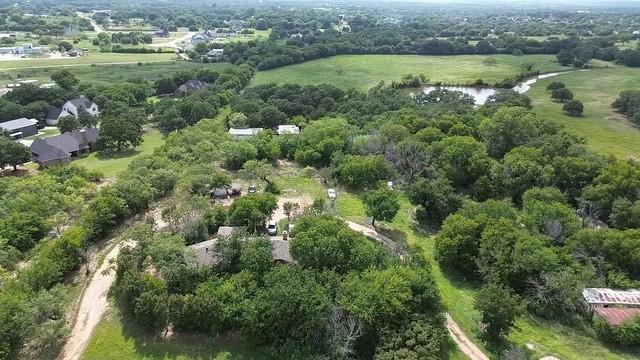 12860 Rendon Road Burleson, TX 76028 - Photo 7 of 9 an aerial view of residential houses with outdoor space and trees