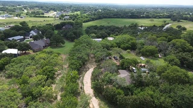 12860 Rendon Road Burleson, TX 76028 - Photo 8 of 9 an aerial view of green landscape with trees houses and lake view