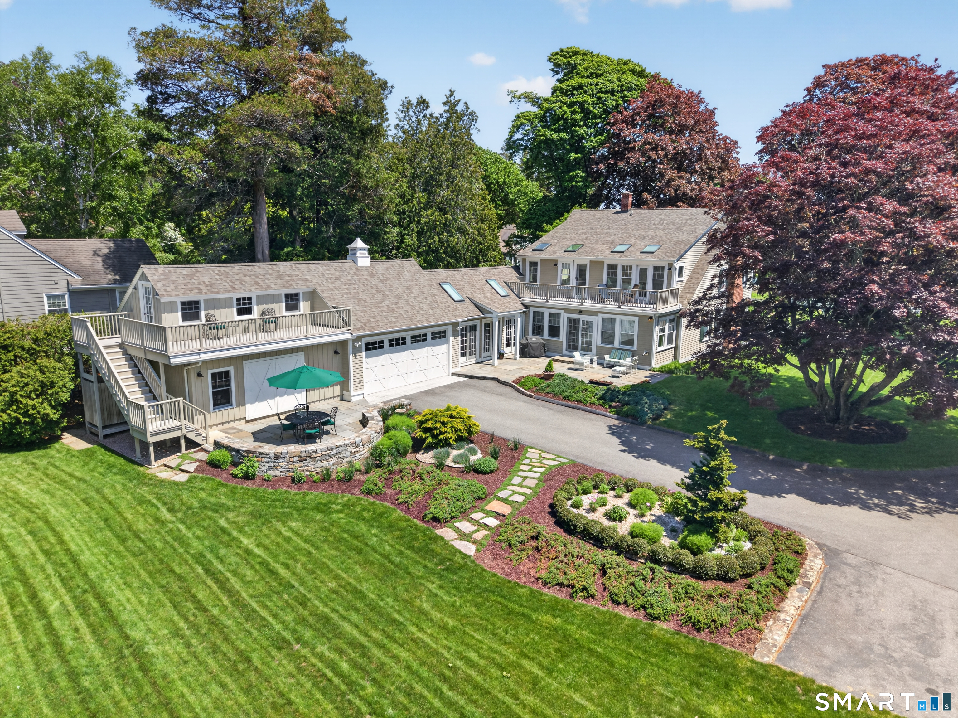 10 Prospect Street Groton, CT 06355 - Photo 2 of 40 an aerial view of a house with a garden and trees