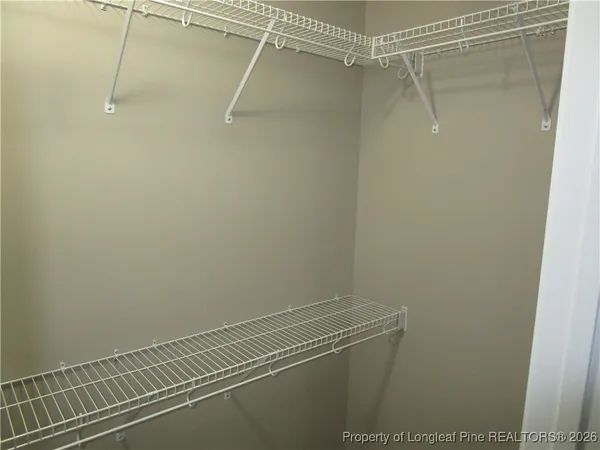 a view of a room with racks on the wall