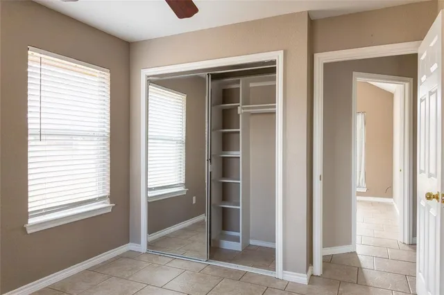 a bath room with a bench