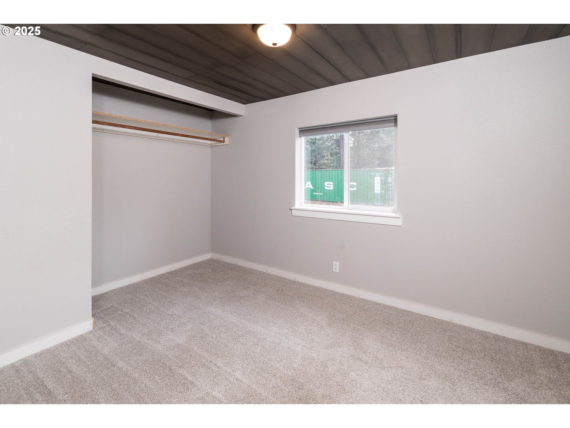 51488 Hann Road La Pine, OR 97739 - Photo 25 of 30 a view of an empty room with a window