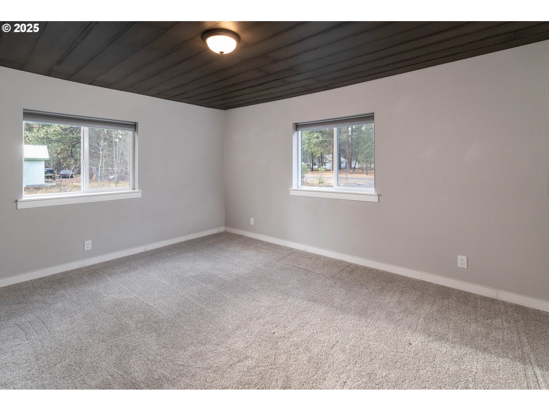 51488 Hann Road La Pine, OR 97739 - Photo 26 of 30 a view of an empty room with a window