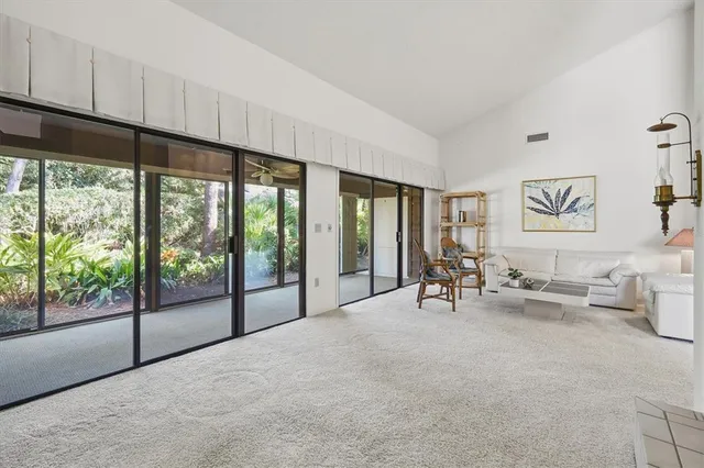 a view of a livingroom with furniture and window