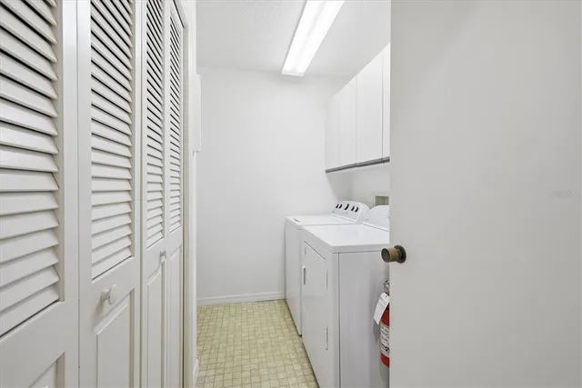 a view of an empty room with windows