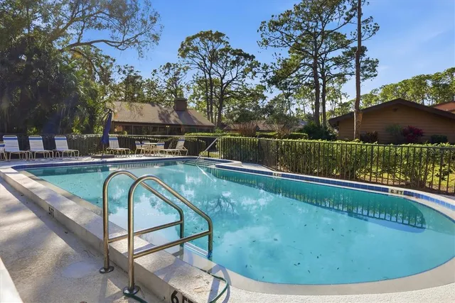 a view of a lake with a building in the background