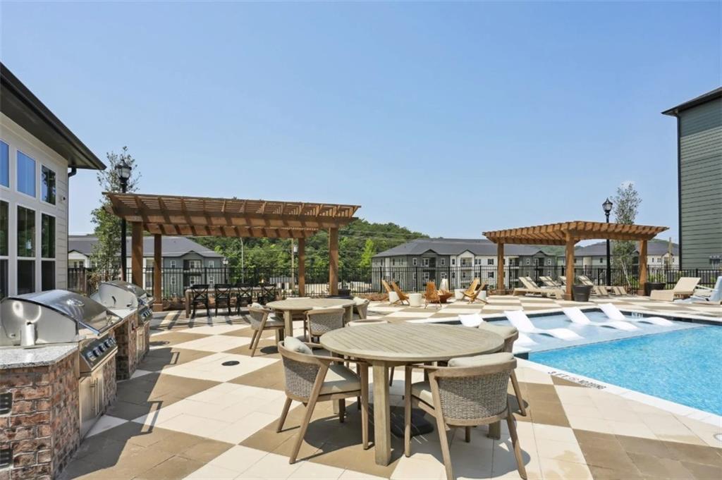 75 Overlook Parkway Southeast, Unit 324 Cartersville, GA 30121 - Photo 14 of 21 a outdoor space with patio area and patio