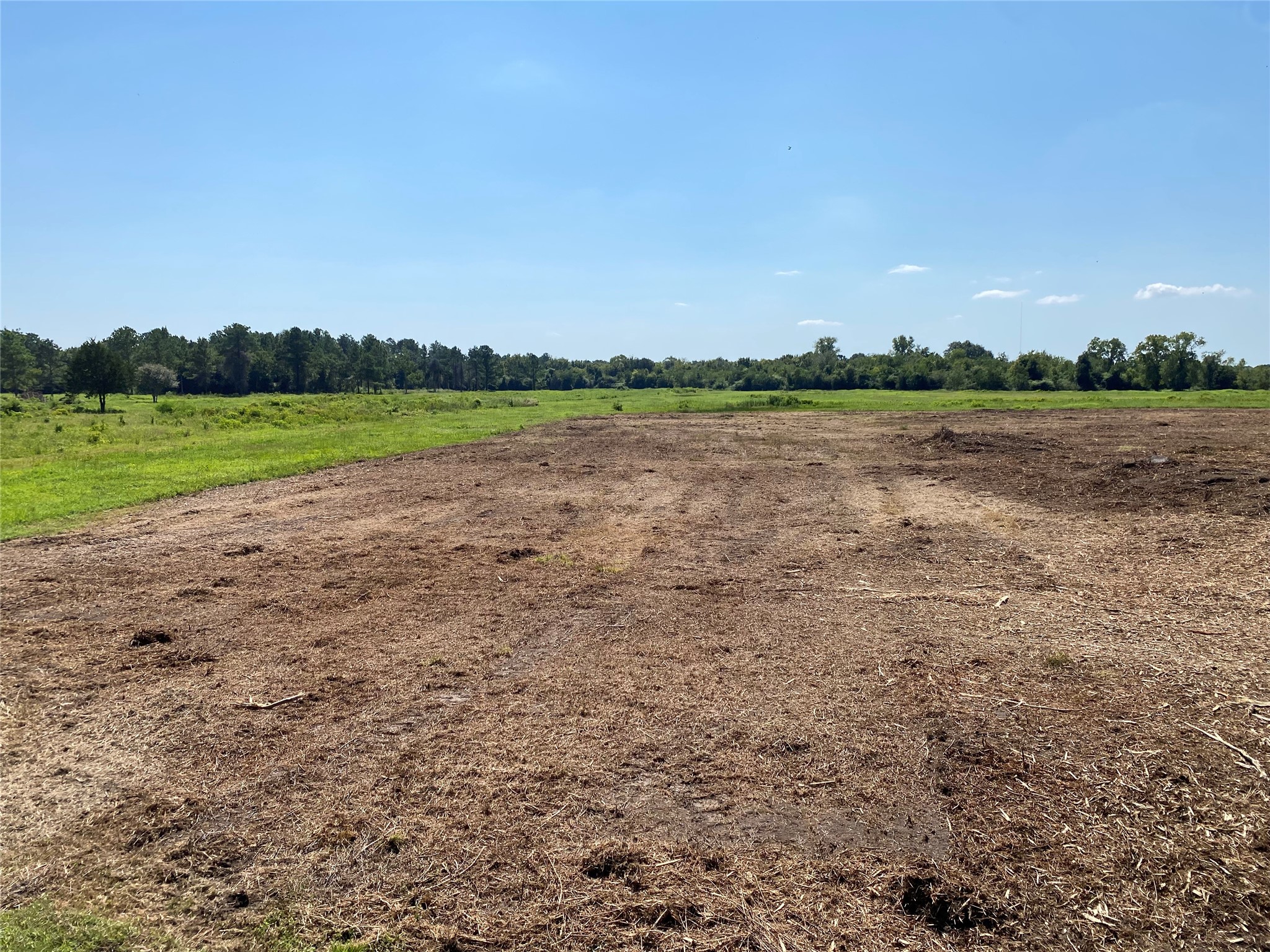 6115 Highway 35 Alvin, TX 77511 - Photo 14 of 49 a view of a lake from a yard