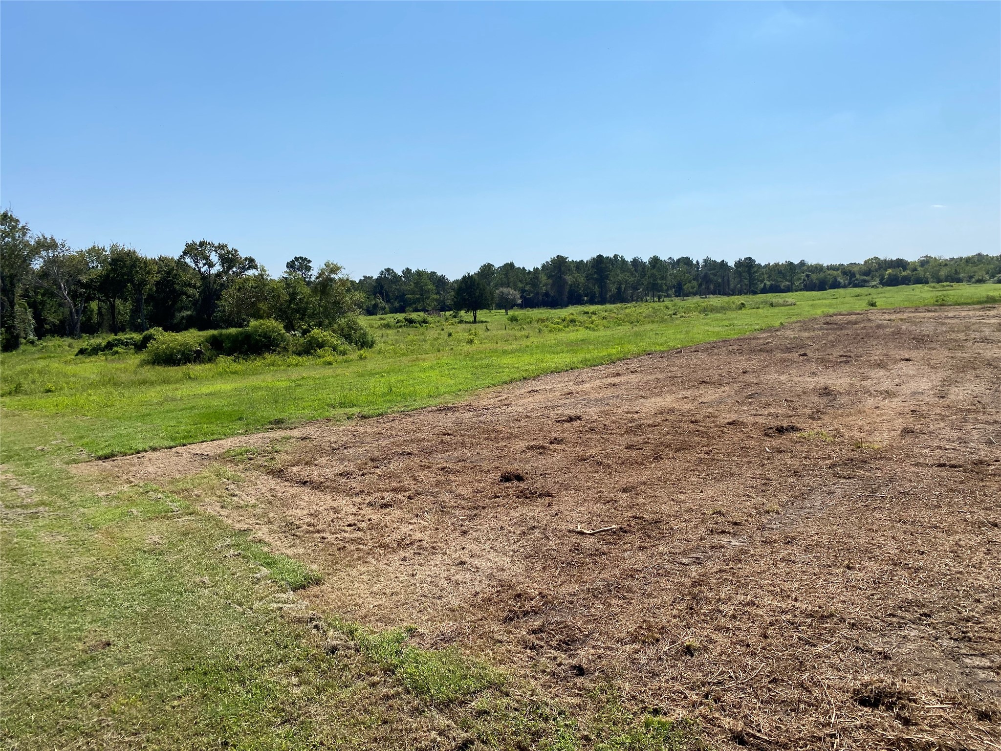 6115 Highway 35 Alvin, TX 77511 - Photo 19 of 49 a view of a lake with houses in the back