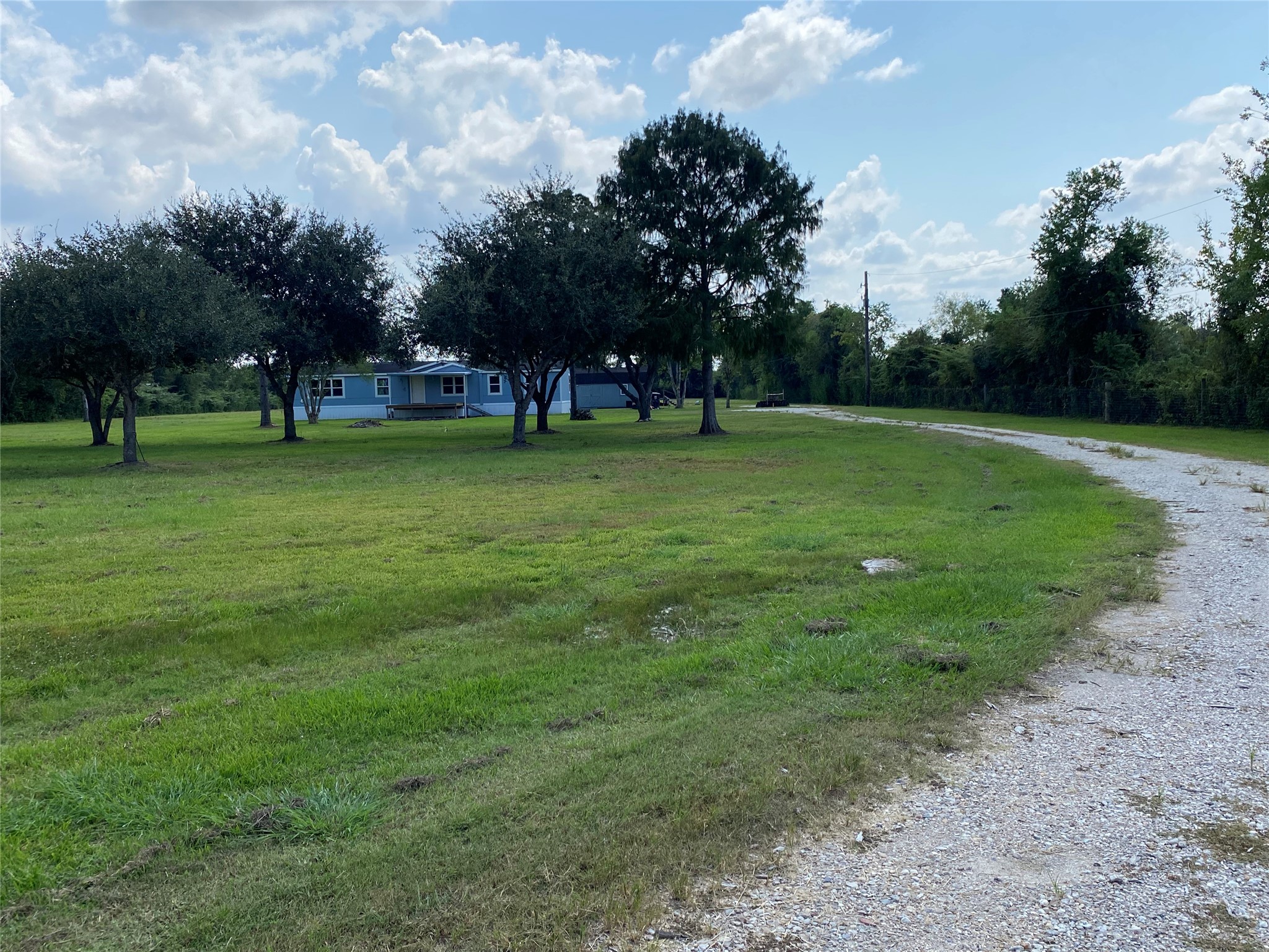 6115 Highway 35 Alvin, TX 77511 - Photo 4 of 49 a view of a park with large trees