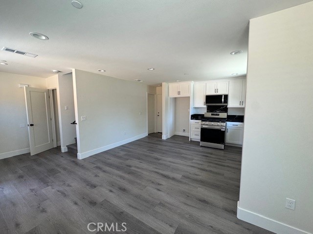 510 Ellis Lake, Unit 1 Lake Elsinore, CA 92530 - Photo 13 of 25 a view of kitchen with wooden floor