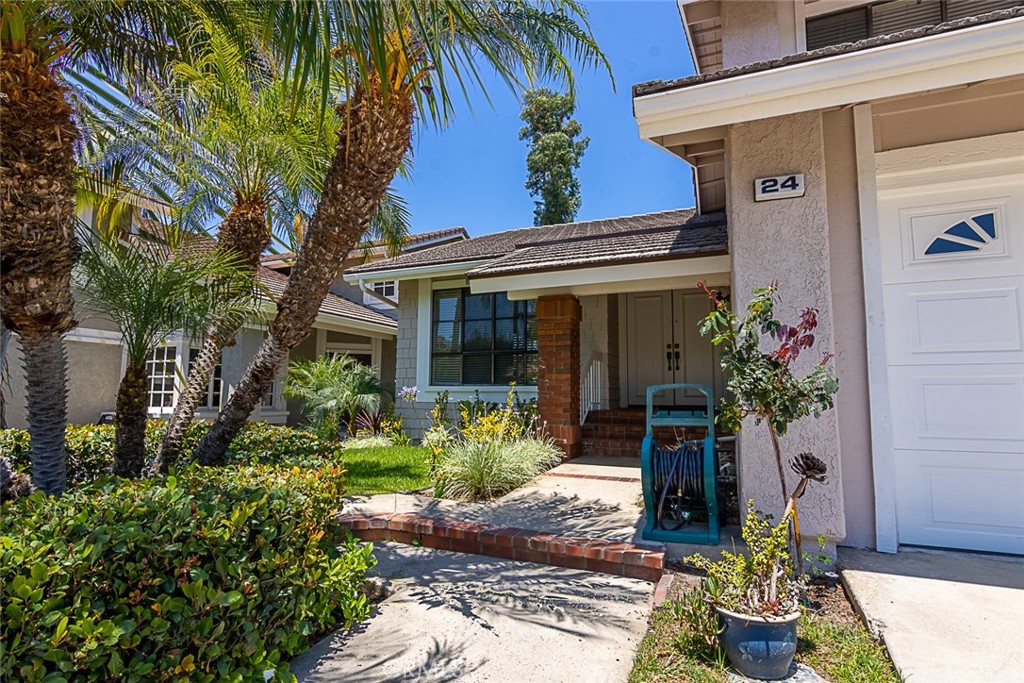 24 Brena Irvine, CA 92620 - Photo 2 of 28 a front view of a house with a yard