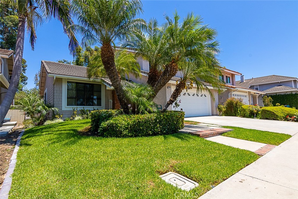 24 Brena Irvine, CA 92620 - Photo 3 of 28 a front view of a house with a yard