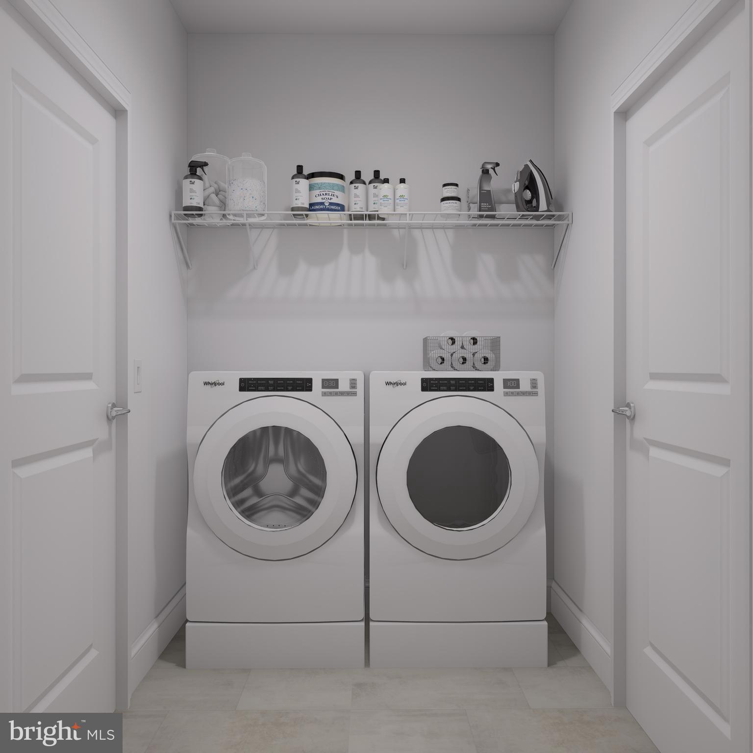 83 Bethlehem Pike, Unit 1213 Colmar, PA 18915 - Photo 12 of 18 a utility room with dryer and washer