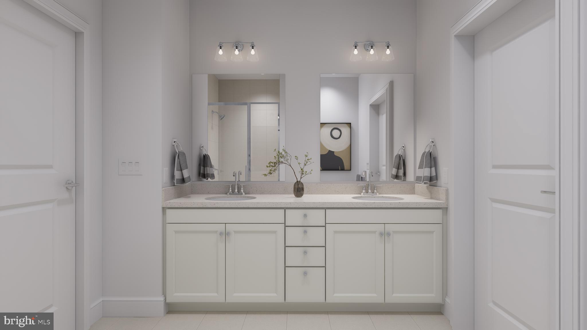 83 Bethlehem Pike, Unit 1213 Colmar, PA 18915 - Photo 13 of 18 a bathroom with double sink and a mirror