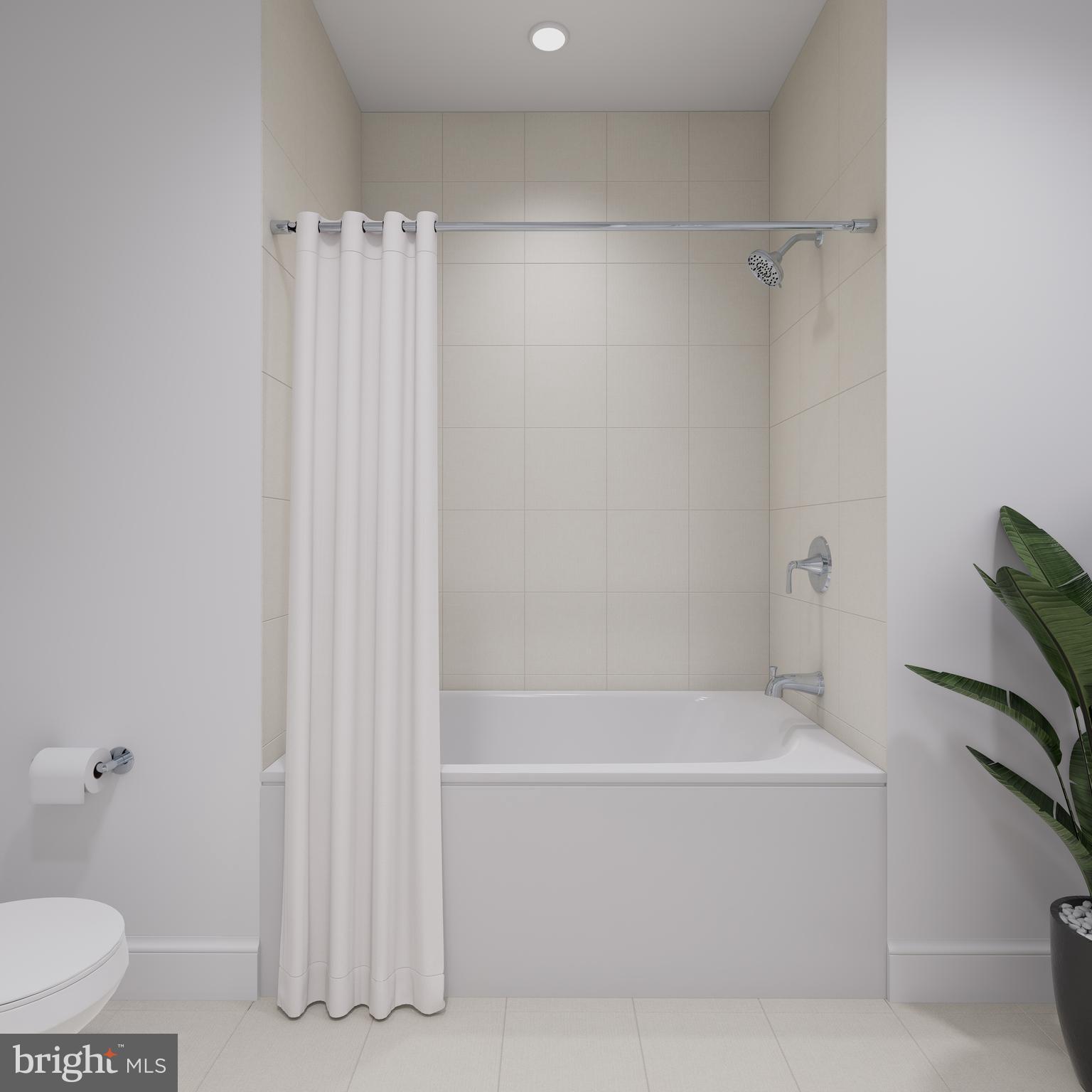 83 Bethlehem Pike, Unit 1213 Colmar, PA 18915 - Photo 16 of 18 a bathroom with a shower and a toilet