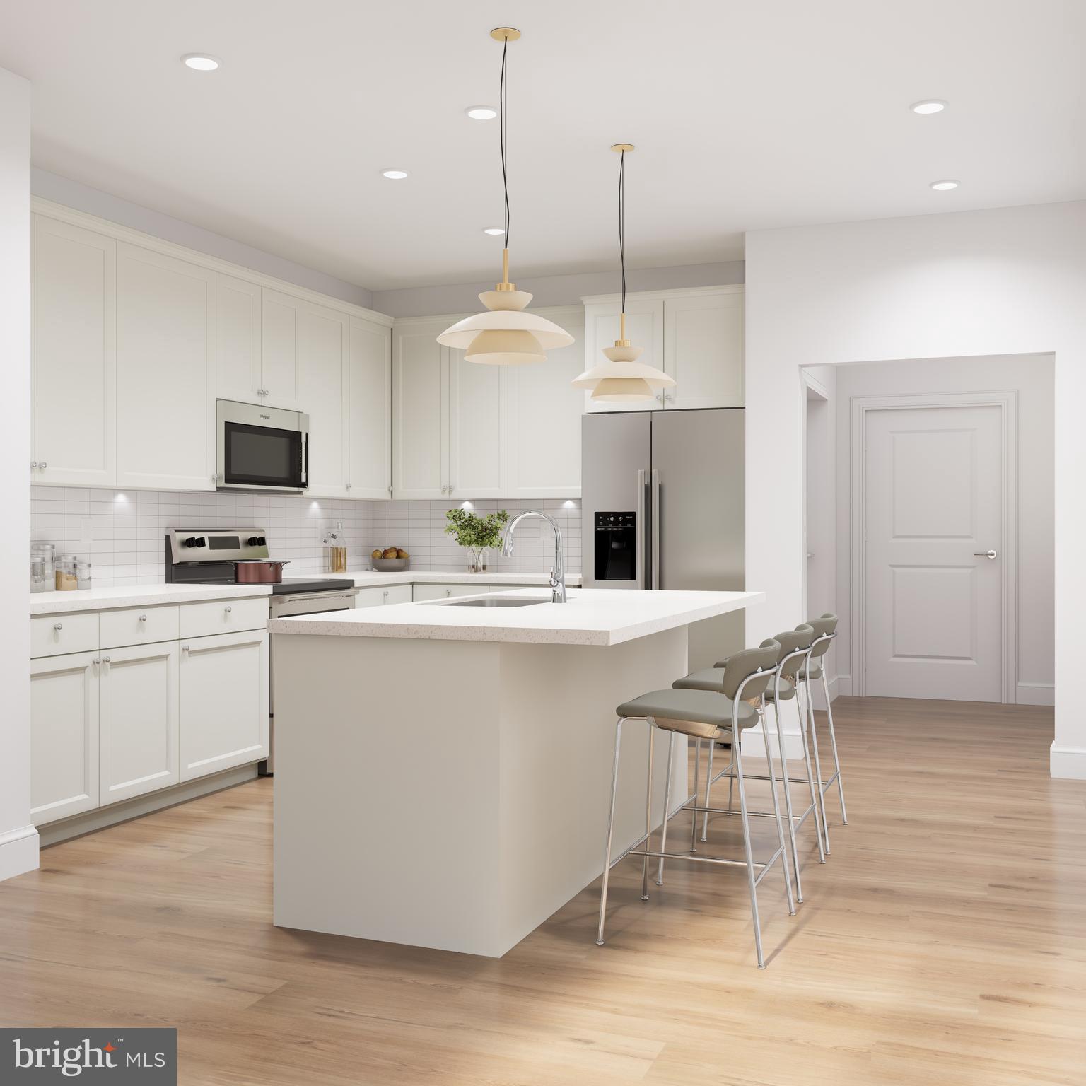 83 Bethlehem Pike, Unit 1213 Colmar, PA 18915 - Photo 3 of 18 a kitchen with granite countertop a stove a sink and a refrigerator