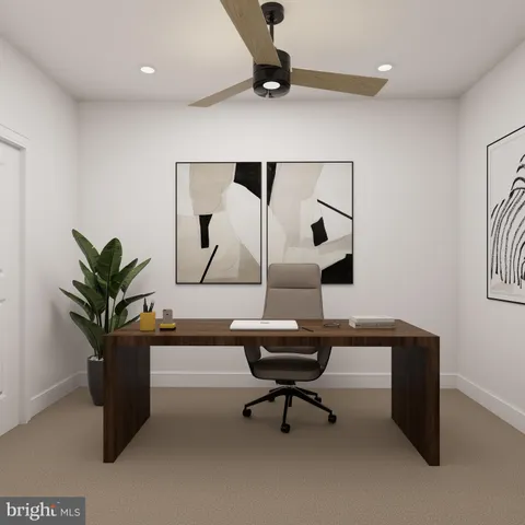 a bedroom with bed and a flat tv screen on dresser