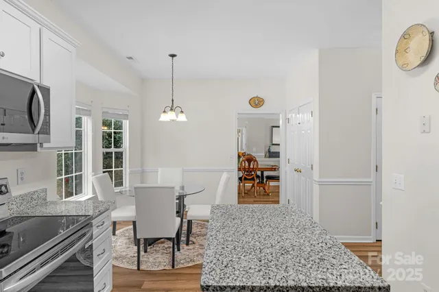 a view of a dining room with furniture