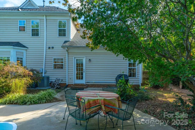 a backyard of a house with seating space