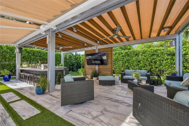 a outdoor living space with furniture and garden view