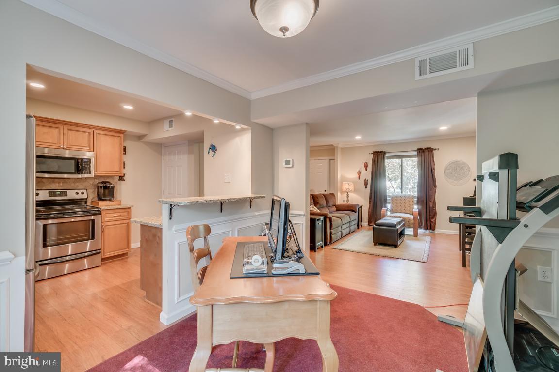 2444 Cloudcroft Square Reston, VA 20191 - Photo 13 of 32 Formal Dining Area Opens to Kitchen & Living Room