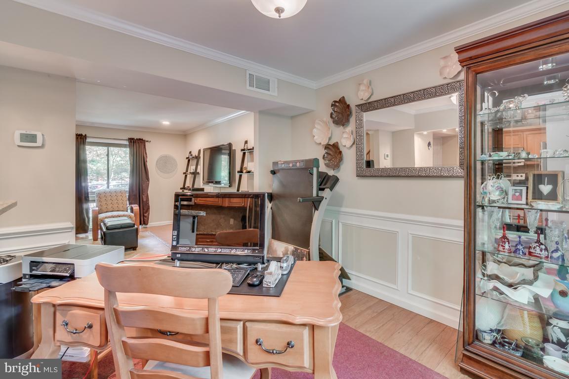 2444 Cloudcroft Square Reston, VA 20191 - Photo 15 of 32 Dining Room Features Wood Floors, Wall Molding