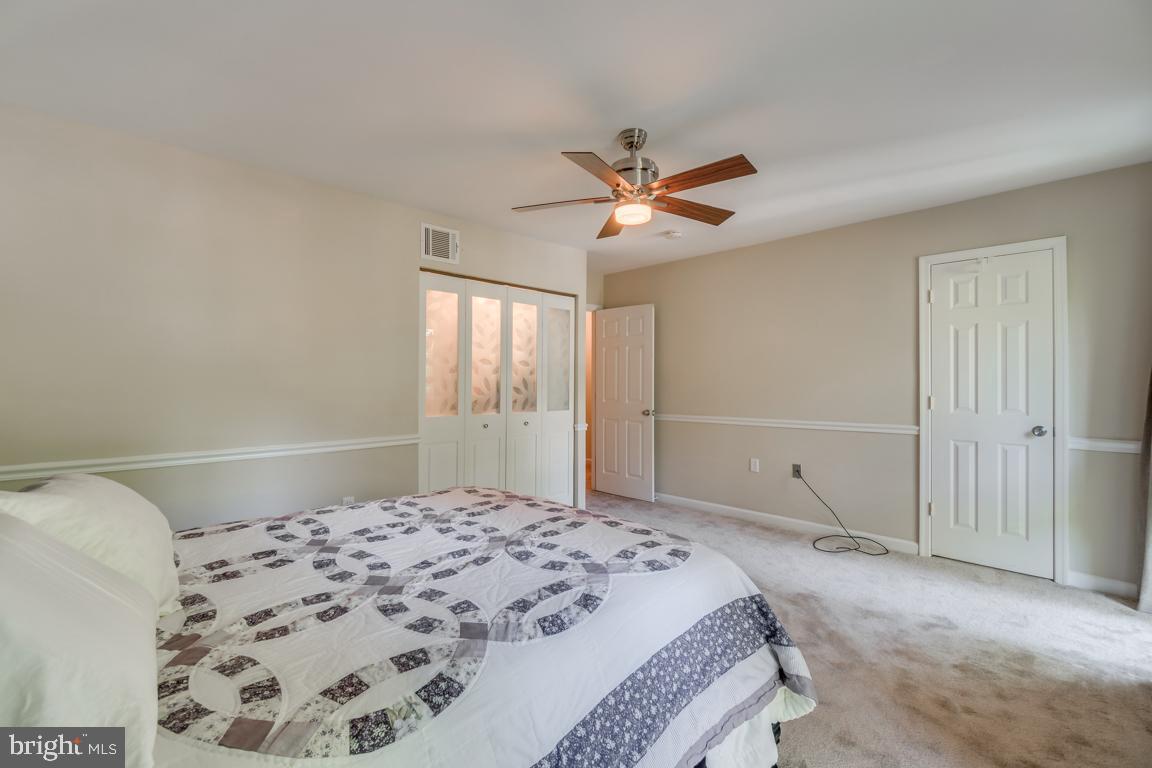 2444 Cloudcroft Square Reston, VA 20191 - Photo 20 of 32 Large Master Bedroom w/Ceiling Fan & 2 Closets