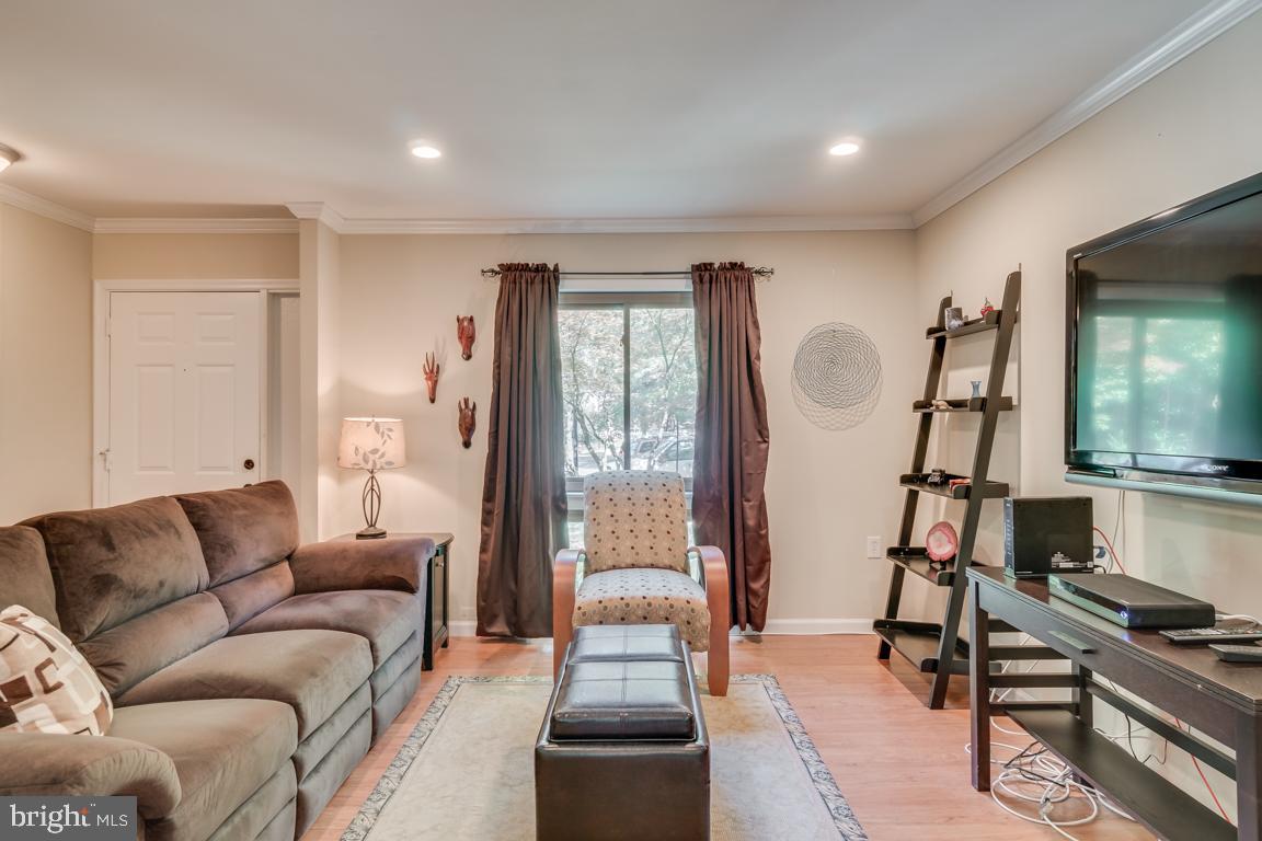 2444 Cloudcroft Square Reston, VA 20191 - Photo 3 of 32 Open Living Room with Beautiful Wood Floors