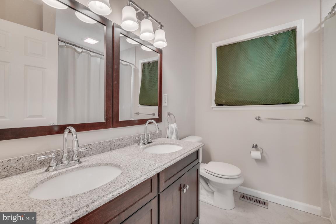 2444 Cloudcroft Square Reston, VA 20191 - Photo 22 of 32 Full Bath w/ Double Vanity, Tile Floors & Showers