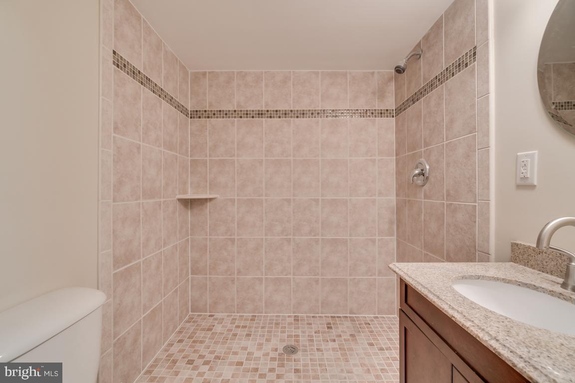 2444 Cloudcroft Square Reston, VA 20191 - Photo 28 of 32 2nd Full Bathroom with Custom Tile Work