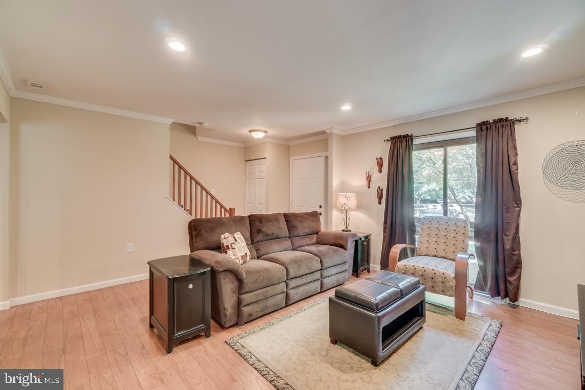 2444 Cloudcroft Square Reston, VA 20191 - Photo 5 of 32 Open Living Room w/ Wood Floors, Recess Lights