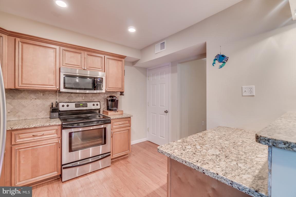 2444 Cloudcroft Square Reston, VA 20191 - Photo 10 of 32 Updated Kitchen with Beautiful Wood Floors